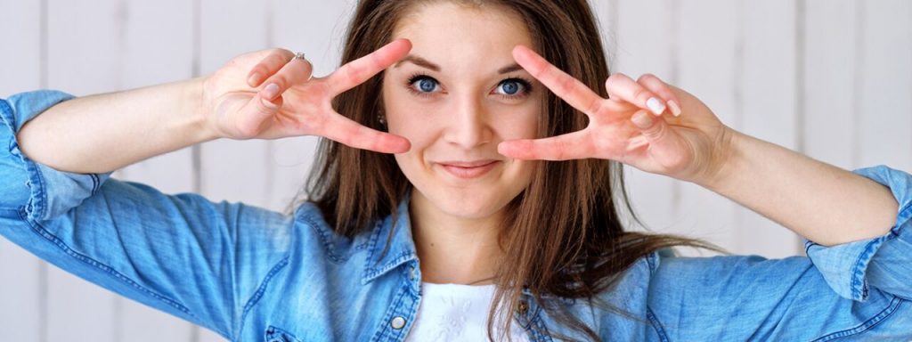 Happy patient getting an Eye Exam